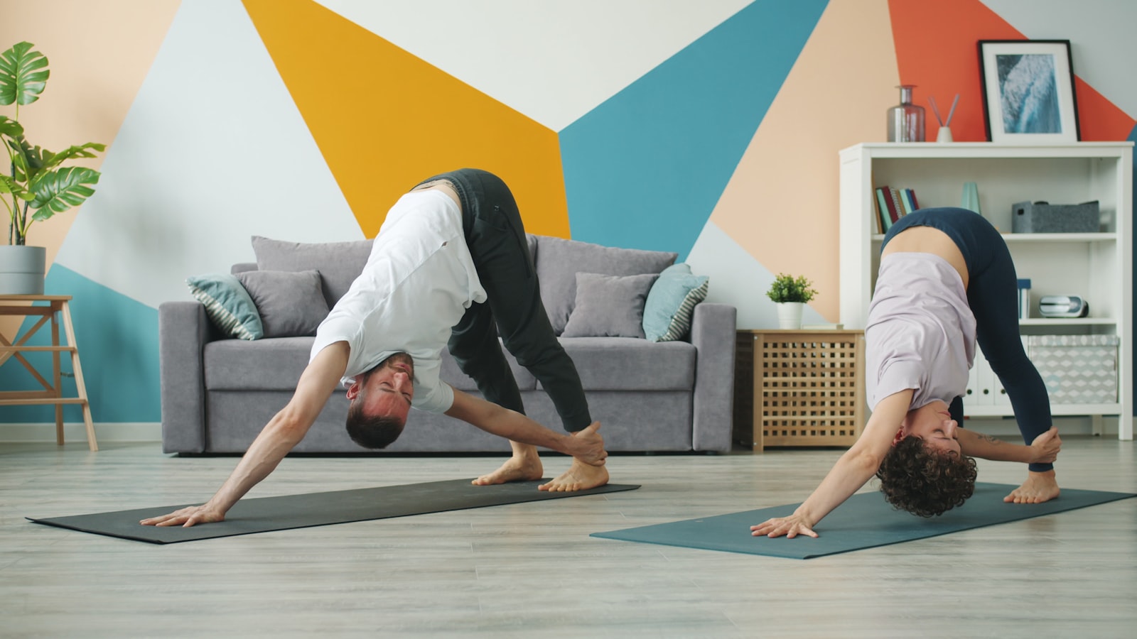 Couple stretching and practicing mobility exercises together