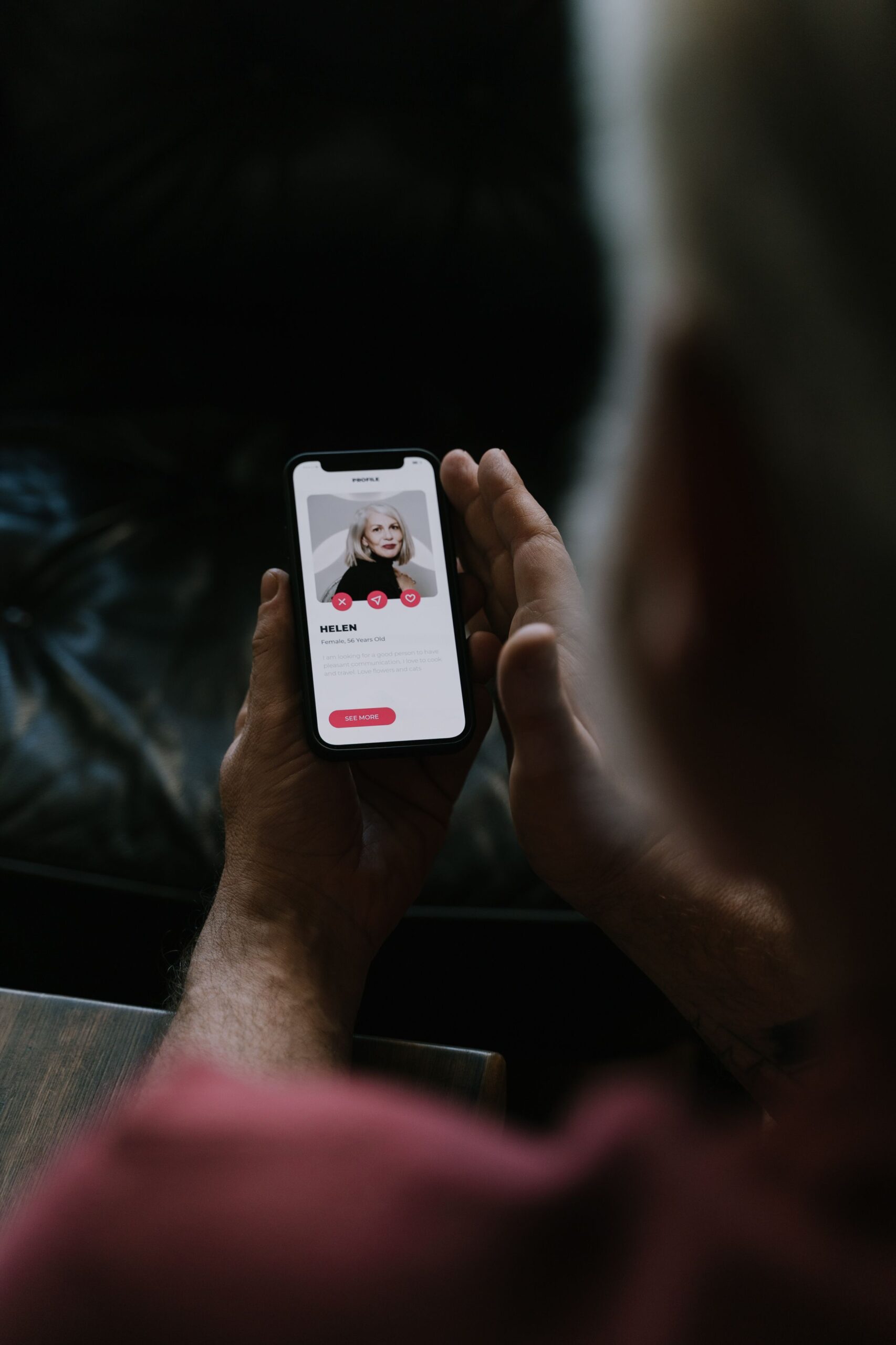 Person using an online dating app safely on a smartphone