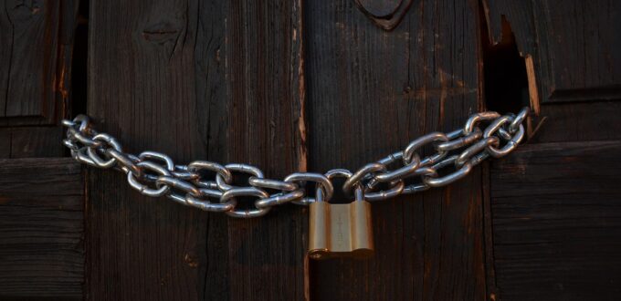 A chained and locked door, symbolizing personal safety and the boundaries that protect it