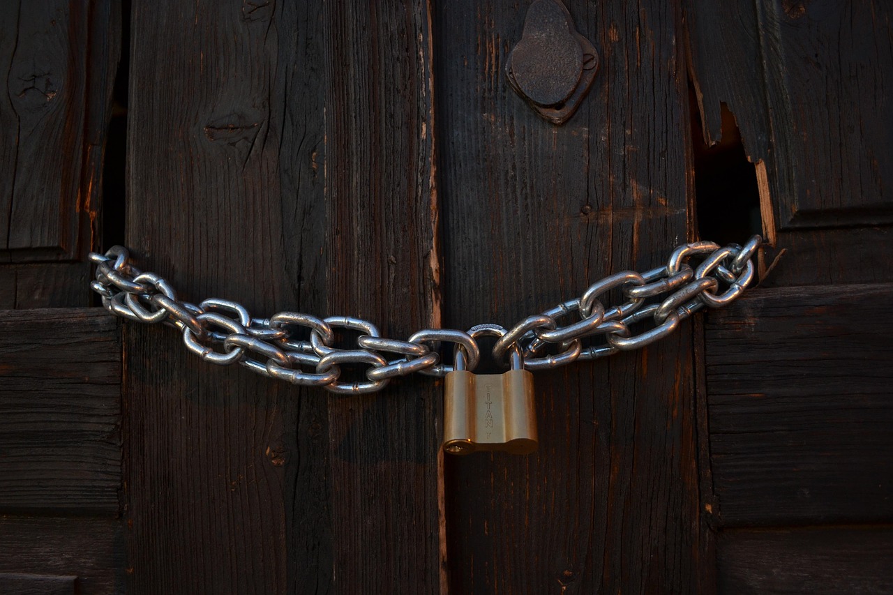 A chained and locked door, symbolizing personal safety and the boundaries that protect it